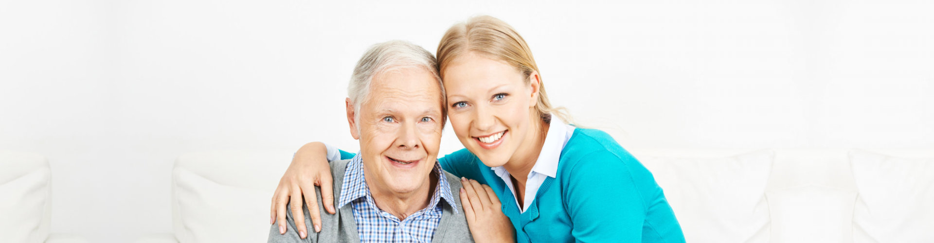 elderly man and woman smiling